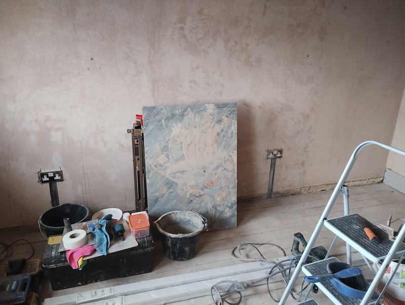 Two double sockets fitted at skirting height on a plastered wall